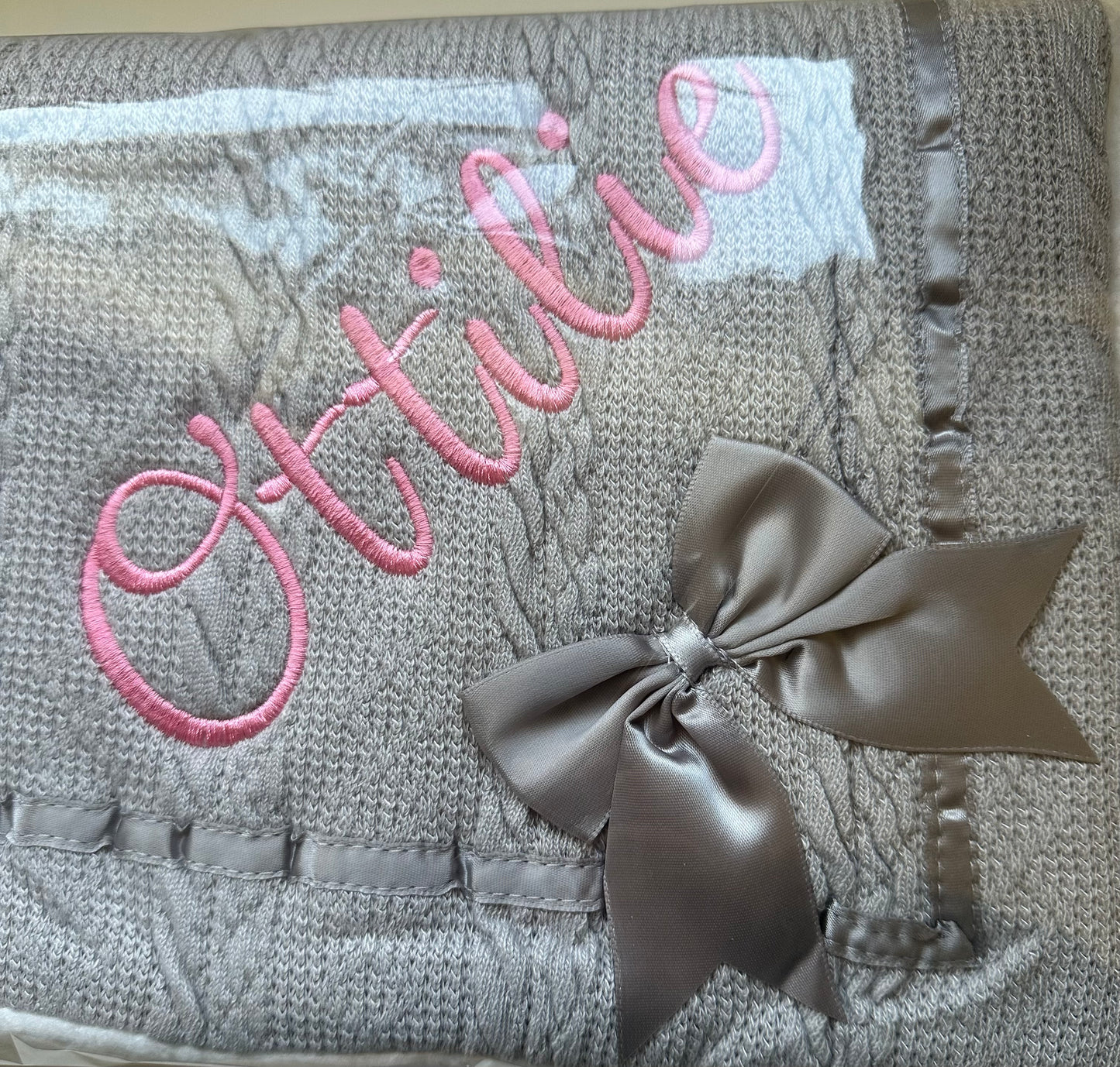 Grey embroidered blanket