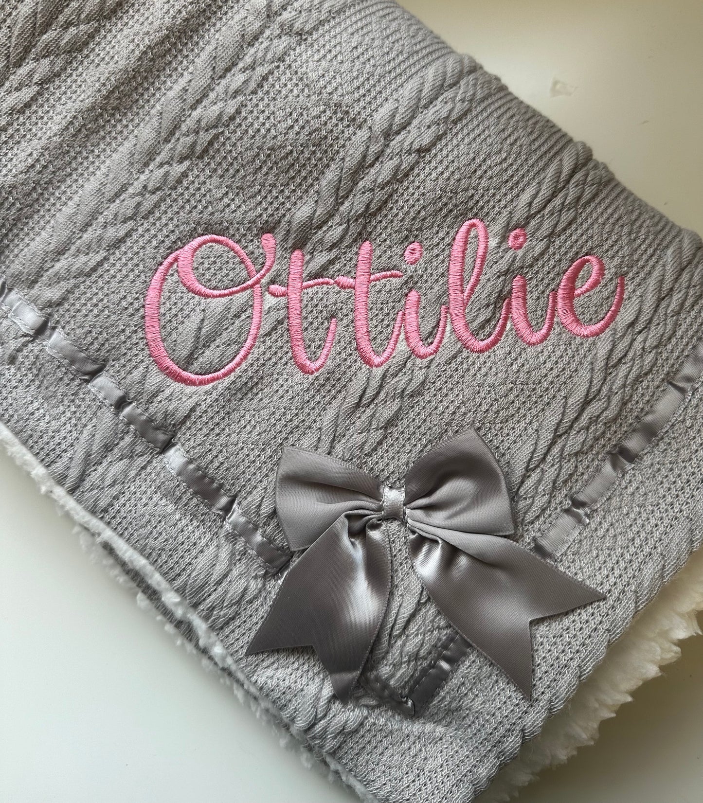 Grey embroidered blanket